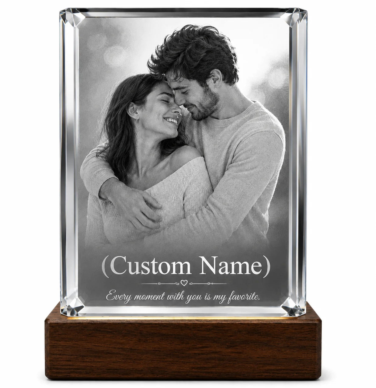 A loving couple in a black and white photo engraved on a glass block with
