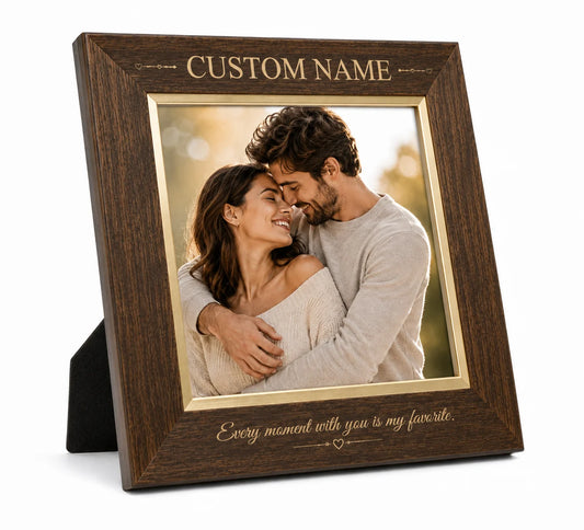 Custom wooden frame with photo of a couple hugging and engraved text