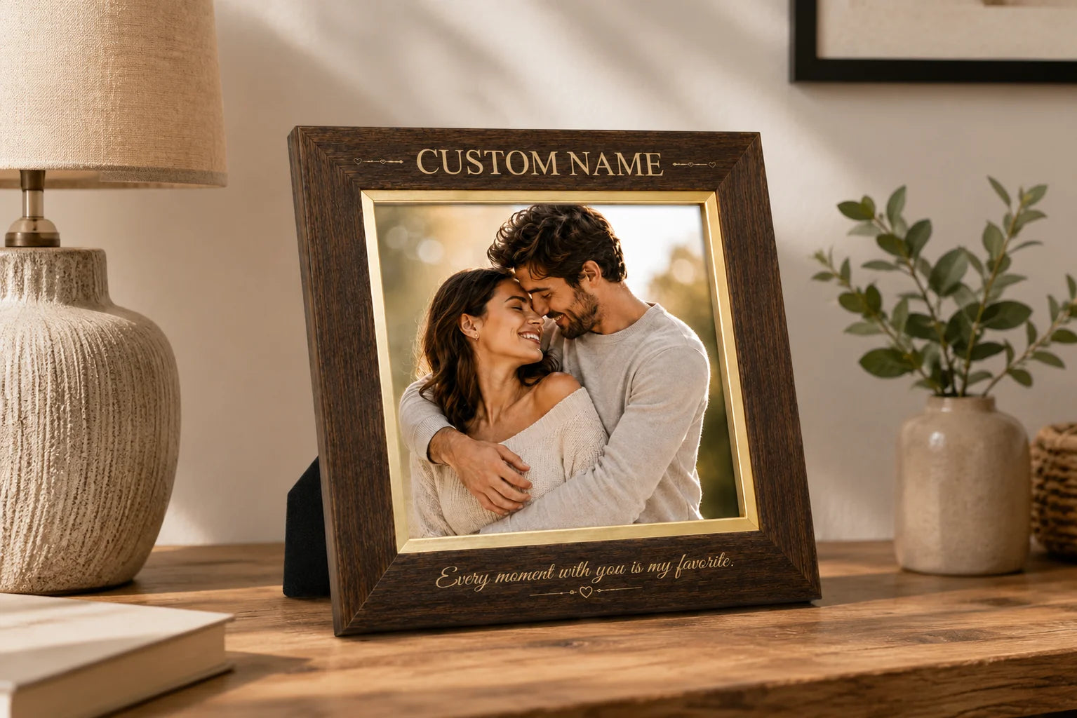 Wooden custom name photo frame with couple’s picture on a table